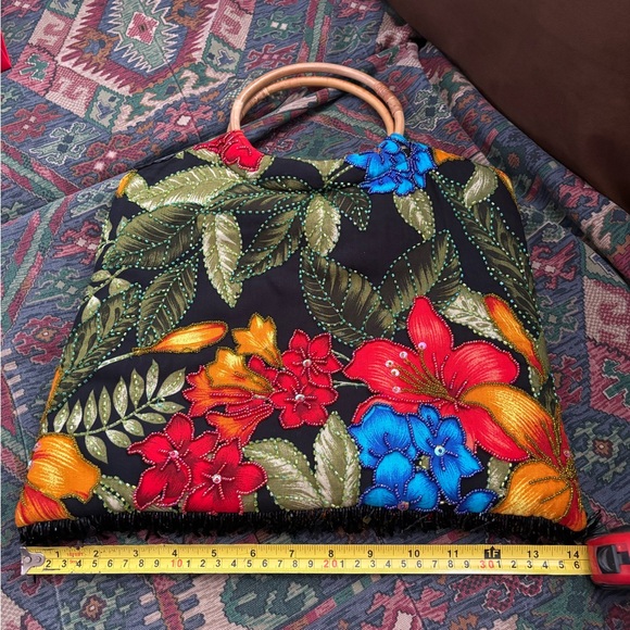 Brightly colored floral bag with beading outline flowers.  Bamboo ring handles. - Picture 4 of 5